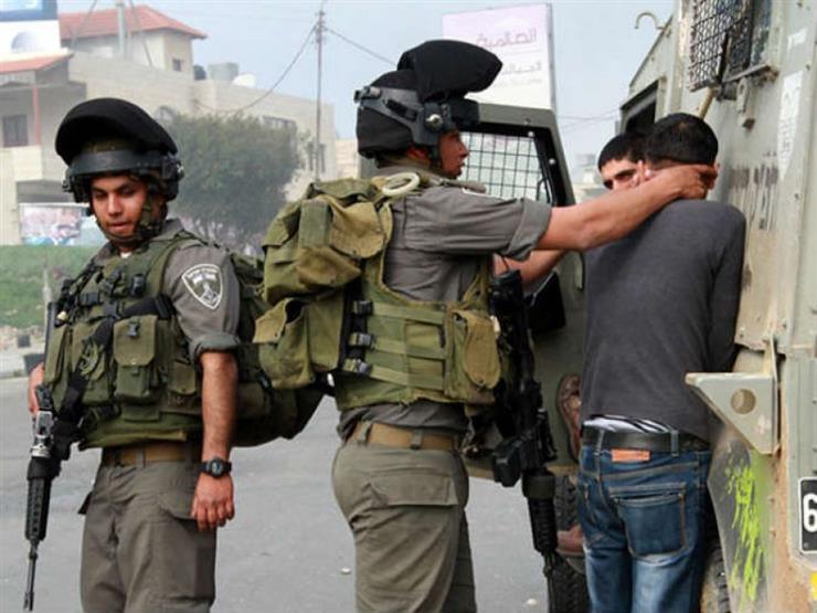 قوات الاحتلال الإسرائيلي تعتقل 14 فلسطينيا من الضفة الغربية 